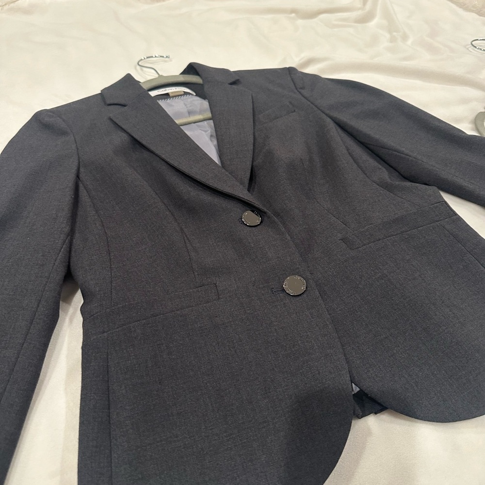 Gray Calvin Klein suit